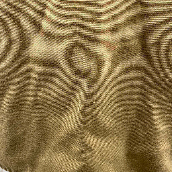 Snag on Back of Vintage Filson Dry Finish Tin Cloth Cruiser