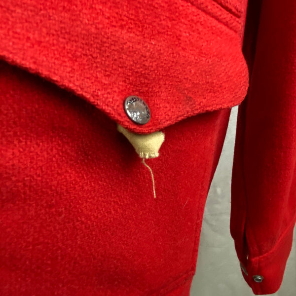 Lower Left Pocket with Damage on Vintage Union Made Filson Scarlet Cruiser Debossed Buttons