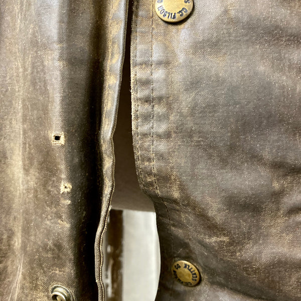 Close Up of Holes on Vintage Filson Tin Cloth Packer Jacket Size XXL